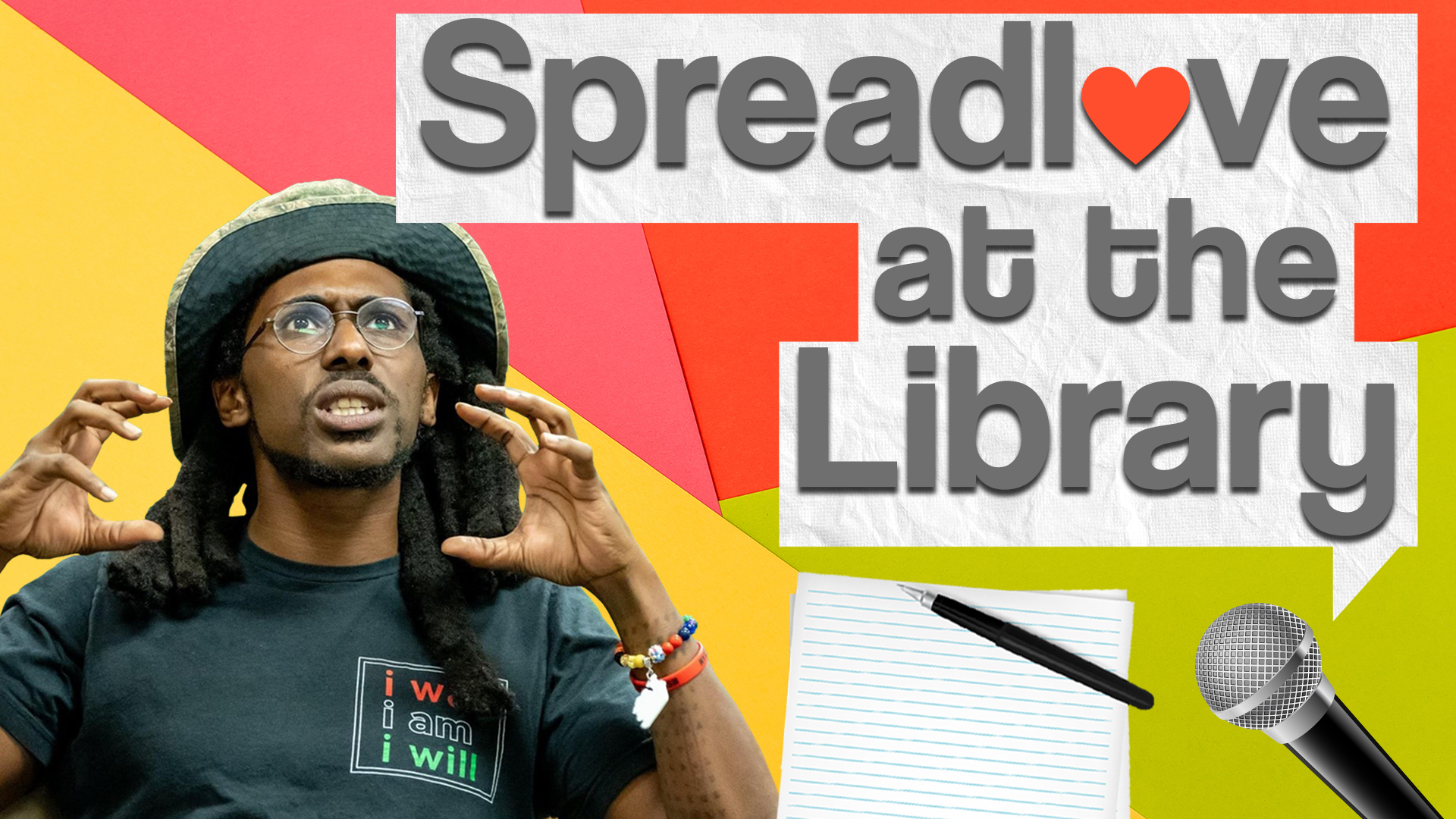 Image reads "Spreadlove at the Library" against a colorful paper background. A piece of paper with a pen and a microphone are under the title.