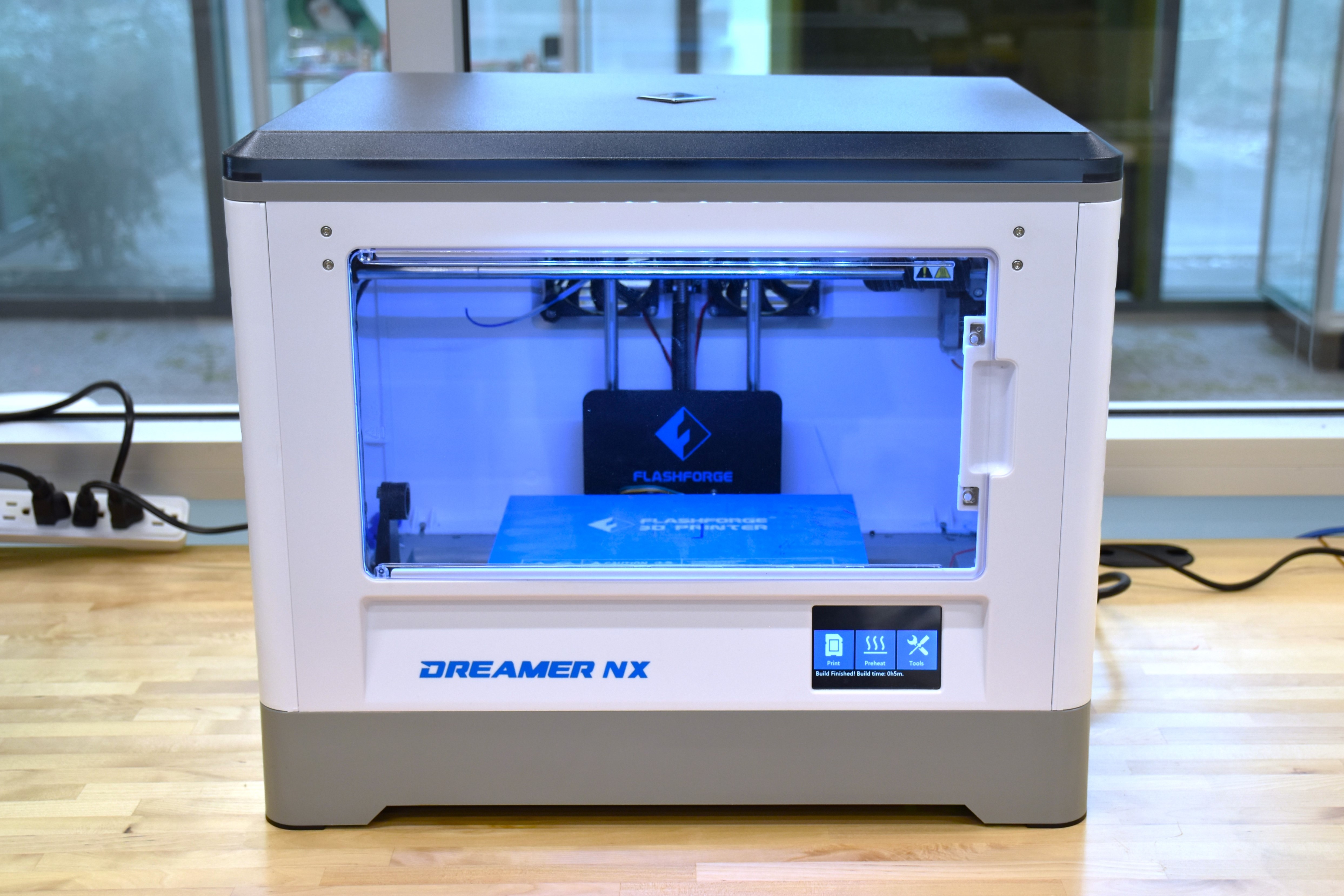 Image shows a Flashforge printer on a table.
