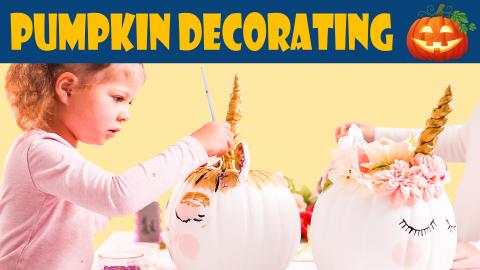 Image reads "Pumpkin Decorating". A little girl painting a unicorn pumpkin takes up the majority of the image.