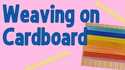 Image reads "Weaving on Cardboard" against a pink background. A cardboard loom is to the right of the title with a yarn design and two popsicle sticks.