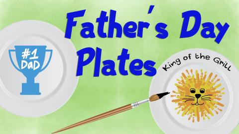 Image reads "Father's Day Plates" against a green watercolor background. To the left of the title is a plate with a blue trophy that says "#1 Dad". To the right of the title is a plate that has children's handprints in the shape of a lion and says "King of the Grill". In between the two plates is a paintbrush with black paint on the end. 