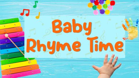 Image reads "Baby Rhyme Time" against a blue wooden background. Pom poms, painted handprints, music notes, and an instrument are scattered among the image.