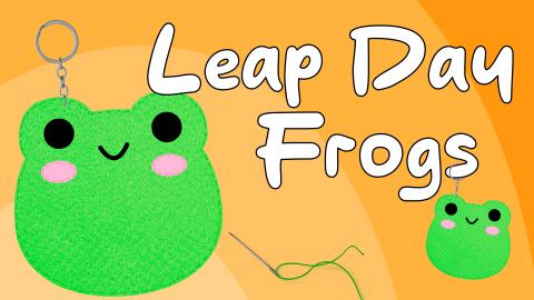 Image reads "Leap Day Frogs" against an orange background. A large felt frog keychain is to the left of the title. Under the title is a smaller felt frog keychain and a needle and thread.