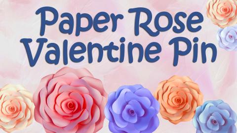 Image reads "Paper Rose Valentine Pin" against a colorful pastel background. Paper roses in various colors are scattered among the image.