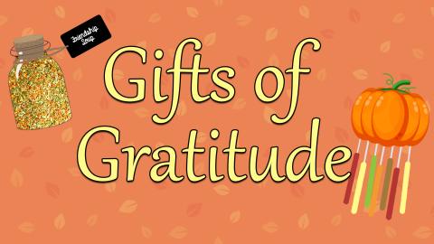 Image reads "Gifts of Gratitude" against a fall background. To the left of the title is a jar of ingredients labeled "Friendship Soup" and to the right of the title is a pumpkin windchime.