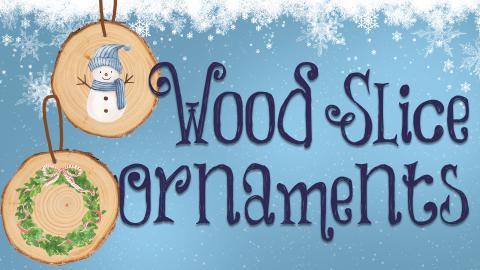 Image reads "Wood Slice Ornaments" against a snowy background. To the left of the title are two wood slice ornaments. The top ornament has a snowman painted on it and the bottom ornament has a wreath painted on it.