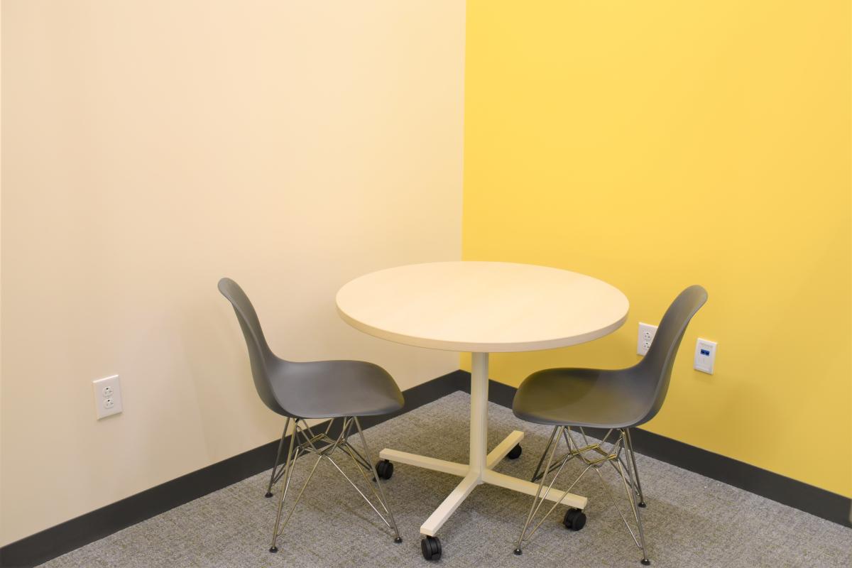 A table with two chairs.