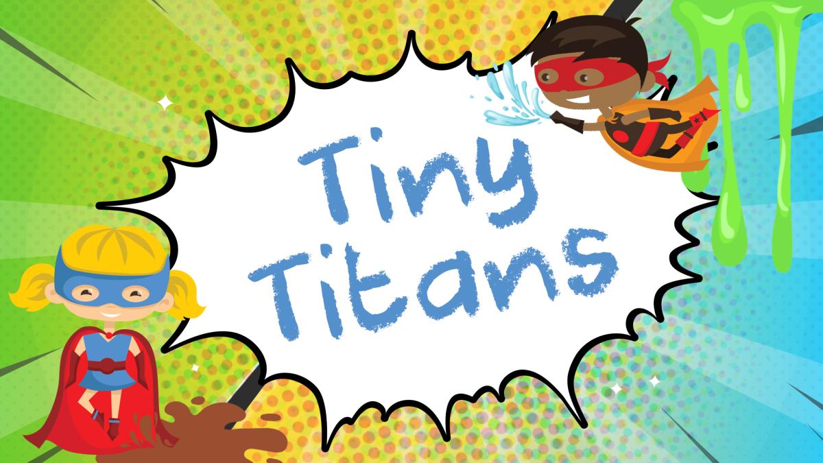 Image reads "Tiny Titans" against a comic book background. Two children dressed as superheroes are on either side of the title and mud, water, and slime are scattered among the image.