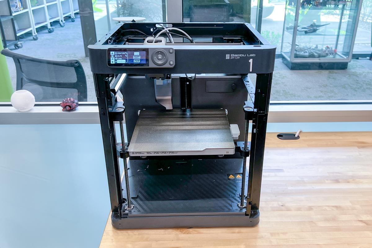 Image shows Bambu Labs P1P 3D printer labeled #1 sitting on a table.