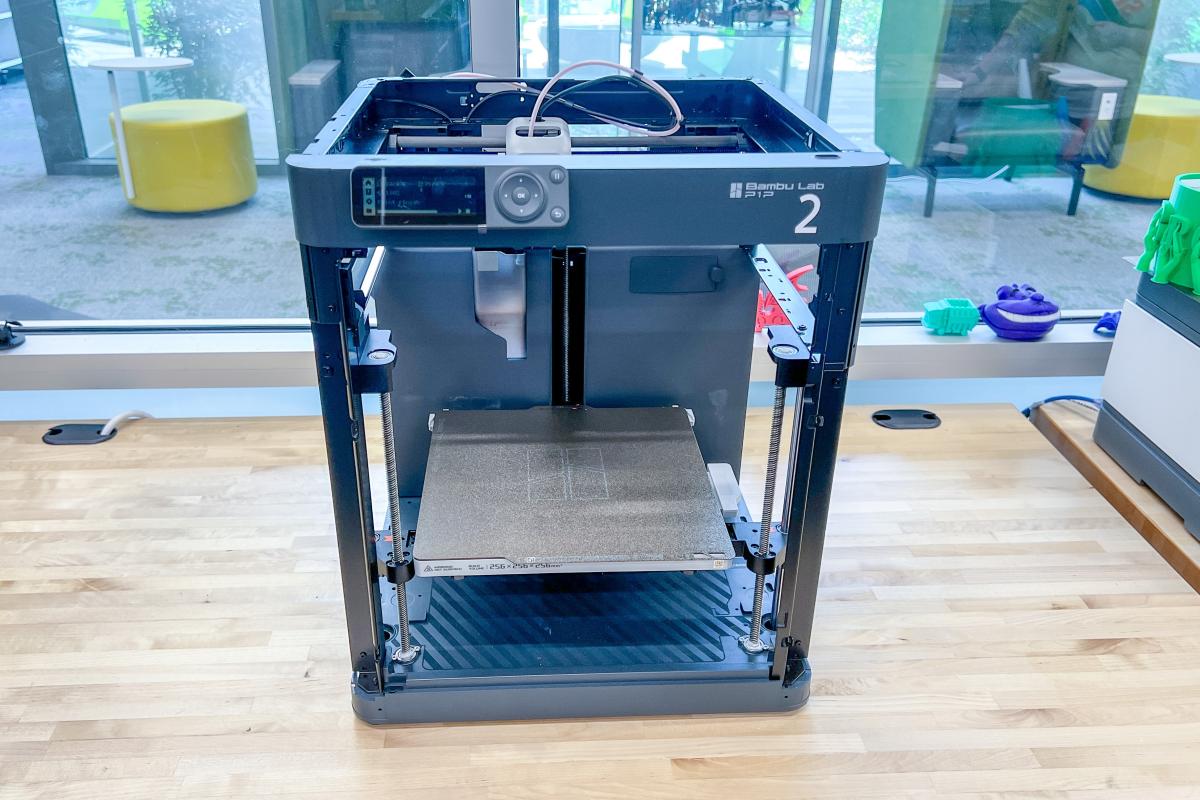 Image shows Bambu Labs P1P 3D printer labeled #2 sitting on a table.